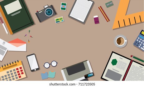 Top view of table working and working desk and free space for text with accessory on the table, laptop, desk top, notebook, camera, pencil, pen, ruler, calendar, letter, coffee cup, printer, glasses