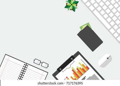 Top view of table working and working desk and free space for text with accessory on the table, laptop, notebook, glasses, flowerpot, wallet