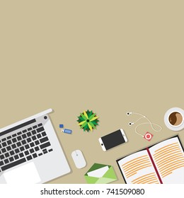 Top view of table working and working desk and free space for text with accessory on the table, laptop, notebook, phone, flash drive, coffee cup, letter, flowerpot, note