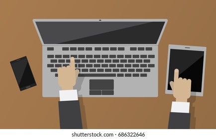 Top view of tablet and smartphone flat design with hand of businessman