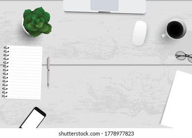 Top view with textured table, laptop and telephone as well as books and mouse and coffee. In the center of the table is a folder-plate with white sheets for your text