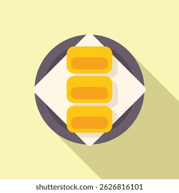 Top view of three pieces of tamagoyaki, a japanese rolled omelette, served on a plate