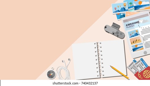 Top view of traveler desk, plan for the trip with empty notebook with copy space for text on pastel color, camera with lens, tablet with searching for dream destination place