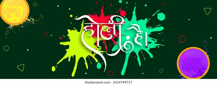 Top View of Two Bowls Filled with Dry Color (Gulal) on Colorful Splash Background with Holi Hai (It's Holi) Hindi Language Message Text for Indian Festival of Colours.