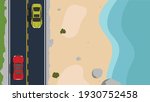 Top view of two cars that run opposite each other on an asphalt road. Tourist area along the wide sandy beach and sea.