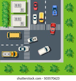 Top view of the urban landscape. Traffic road with cars, houses and trees. Scenery from above of the city.