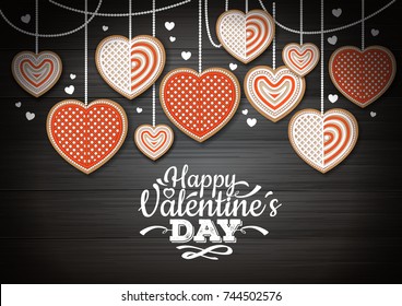 Top view of valentine cookies on wooden background. Happy Valentine`s Day