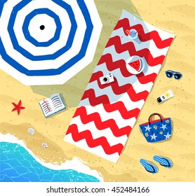Top view vector illustration of beach mat, parasol and summer accessories lying on sand near sea surf.
