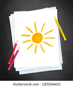 Top view vector illustration of child drawing of sun on white paper on chalkboard background with pencils.