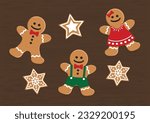 Top view vector illustration of gingerbread man, woman,  star and snowflakes