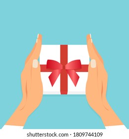 Top view vector of two female hands holding gift box with red ribbon. 