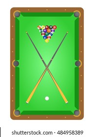 Top view of wooden billiard table with green cloth the billiard balls and two crossover billiard cues on the table on a white background. Pool table ready to play