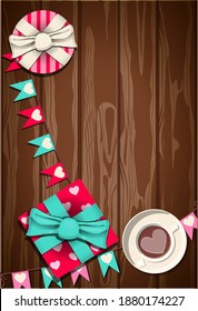 Top view of a wooden table with Valentine s Day items. Romantic picture in pink, turquoise and red. Gifts, sweets, goods for celebrating Valentine s Day. Beautiful invitation to the party of all