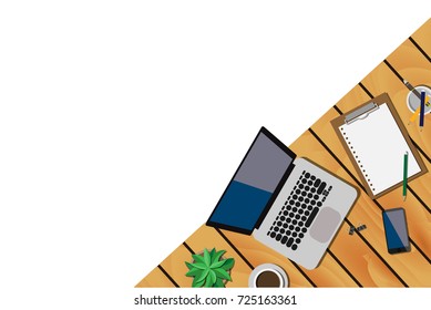 Top view of working desk with laptop, mobile phone, and empty paper note with copy space for your own text