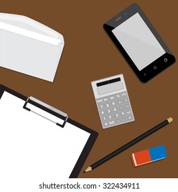 Top view of working place with elements on wooden table background pencil, eraser, smartphone, calculator and envelope. Business desktop. Workplace concept
