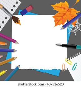 top view of working place elements behind the grey Desk. Stationery, writing of the text.