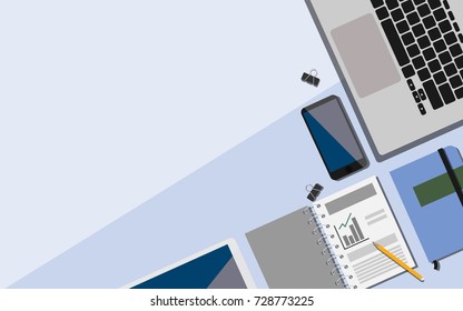 Top view of working space on  business desk with laptop, mobile phone, notebook, tablet with copy space for your text 