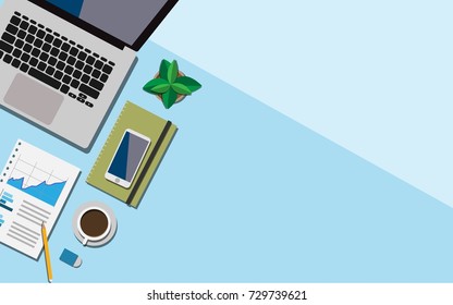 Top view of working space on business desk with laptop, a cup of coffee, working paper with business graph and mobile phone with copy space for your text 