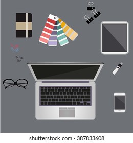 top view workspace with laptop and devices-vector