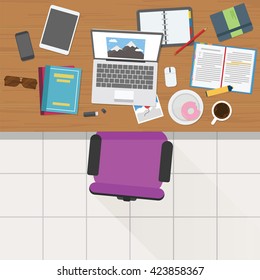 Top view of writer working desk with stuff and laptop