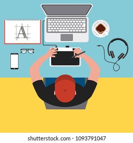 top view young man designer working computer tools at desk
