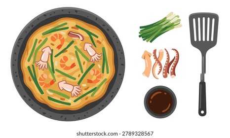 A top-down view of a savory seafood pancake, complete with shrimp, squid, and green onions, served with a side of dipping sauce and a spatula.