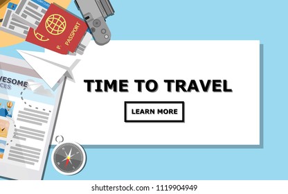 Topdown view of white paper with copy space for text surrounding with tablet, passport,airplane's ticket, camera and compass on the light blue pastel background
