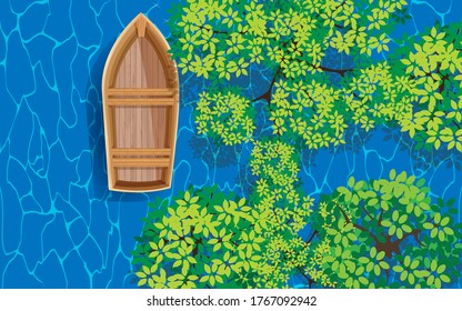 topview wooden boat in the mangrove forest on the beach