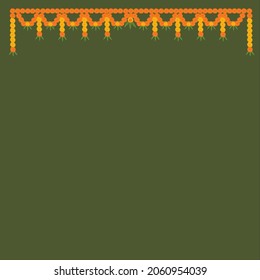 Toran Indian door decoration with marigold flowers in yellow and orange color and mango leaves on sap greencolor background