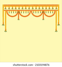 Toran Indian traditional hanging decoration with orange and red marigold flowers and green leaves on light yellow background.