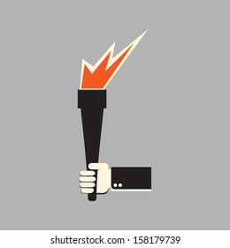 torch in a hand - light in darkness