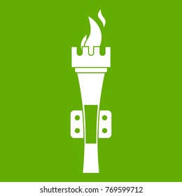 Torch icon white isolated on green background. Vector illustration