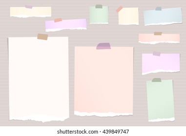Torn colorful note paper pieces are stuck with sticky tapes on stripes background