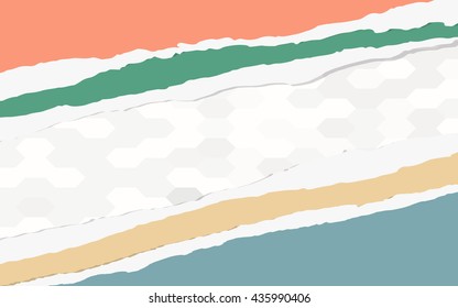 Torn colorful paper pieces are stuck on gray hexagon pattern
