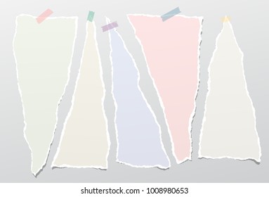 Torn colorful pastel note, notebook paper strips stuck with sticky tape on gray background