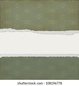 Torn paper against a dark background