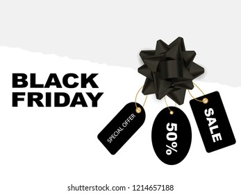 A torn paper with black labels with black bow. Black friday concept. Vector illustration.