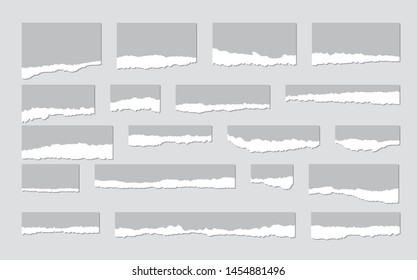 Torn sheets of paper. A set of torn paper and strips of paper on a dark background. Vector illustration.