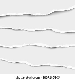 Torn strips of paper placed on top of each other