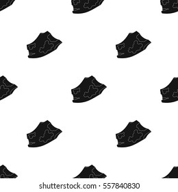 Torn t-shirt icon in black style isolated on white background. Trash and garbage pattern stock vector illustration.