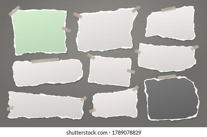 Torn of white and colorful note, notebook paper strips and pieces stuck with sticky tape on dark grey background. Vector illustration