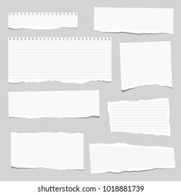 Torn White Note, Notebook Paper Strips Stuck On Gray Background.