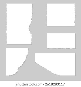 Torn white paper sheets on gray background.