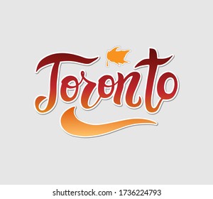 Toronto  city text design with maple leaf typographic banner. Vector illustration of handwritten lettering "Toronto" for t-shirt design, postcards, logos, banner, poster or textile.