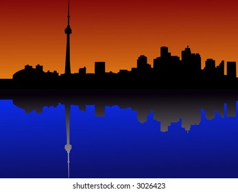 Toronto skyline at dusk reflected in water