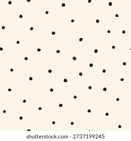 Tossed small black dots on cream white Seamless Vector Pattern Hand Drawn polka dots background