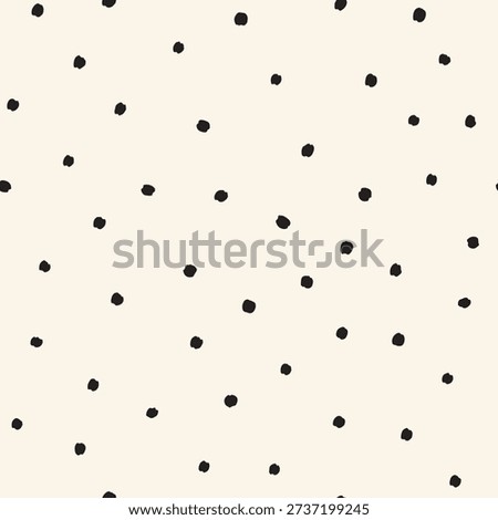 Tossed small black dots on cream white Seamless Vector Pattern Hand Drawn polka dots background