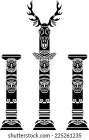 Totem pole with a deer skull and Indian masks