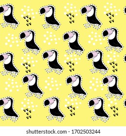 Toucan bird on a yellow background seamless pattern. Vector illustration for children. Summer wallpaper