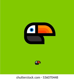 Toucan logo. Tropical bird emblem. Toucan flat icon, isolated on a green background. 